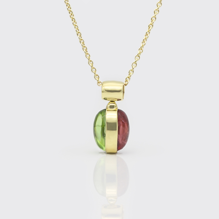 drehbarer Anhänger mit Turmalinen und Peridot drehbarer Anhänger mit Turmalinen und Peridot