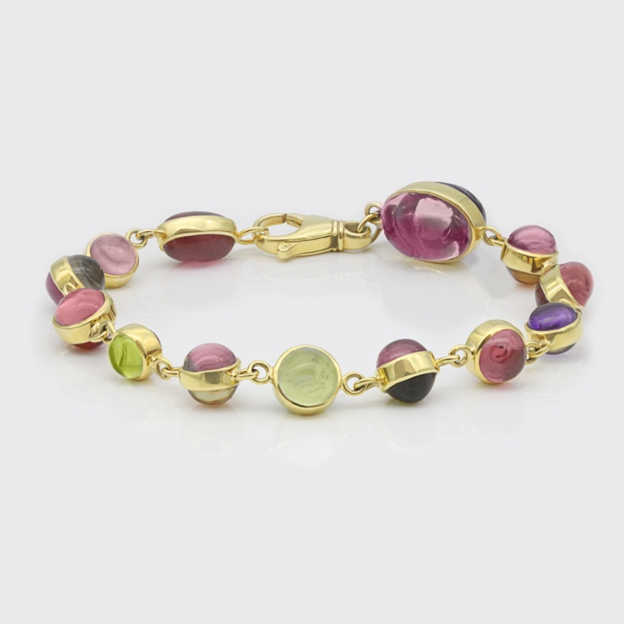 Goldarmband aus Cabochons Goldarmband aus Cabochons