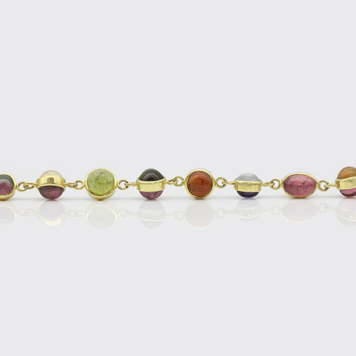 Goldarmband aus Cabochons Goldarmband aus Cabochons
