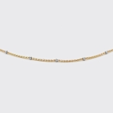 Goldkette mit Weißgoldscheiben Goldkette mit Weißgoldscheiben