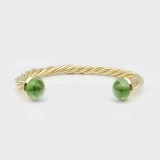 Kordelarmspange mit Peridot Kordelarmspange mit Peridot