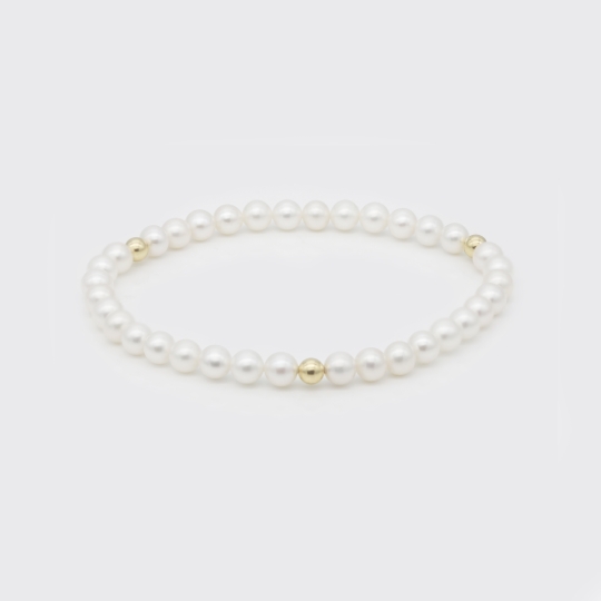 Perlarmband mit Goldkugeln